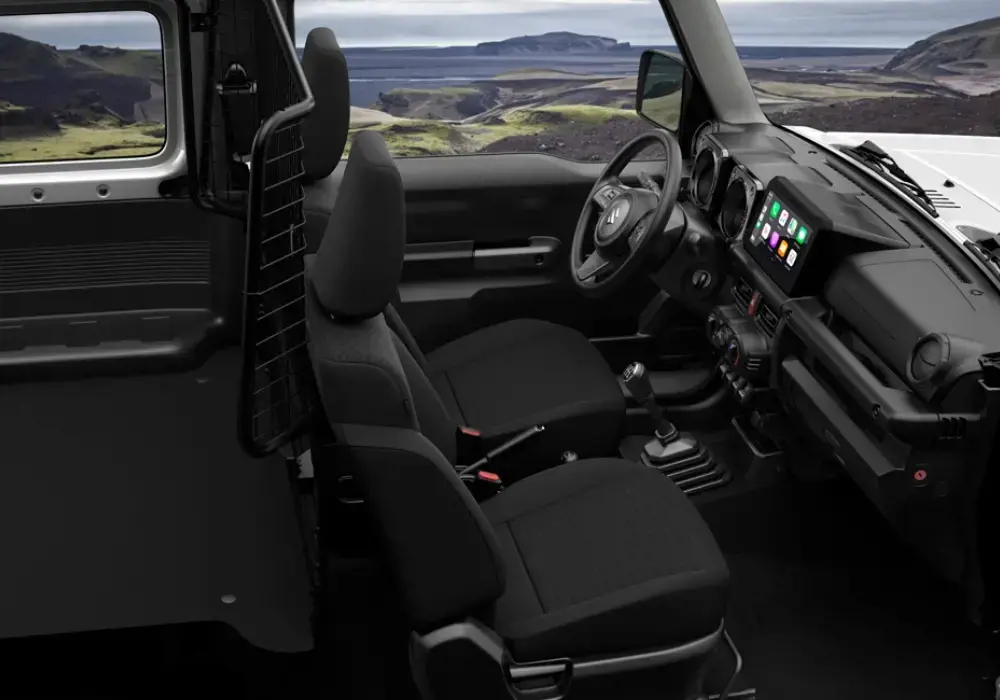 Vista interior de un Suzuki Jimny con su freno de mano